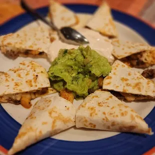 a plate of quesadillas