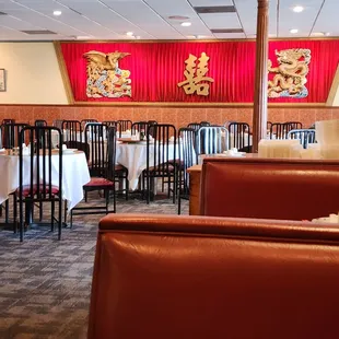 a restaurant with tables and chairs