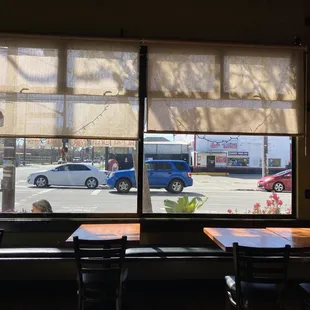 Super cute tables inside with tons of windows!
