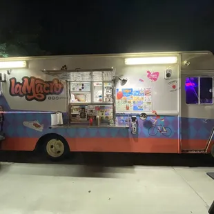 a food truck parked in a parking lot