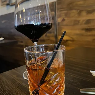 Happy hour drinks-House Merlot and Old Fashion