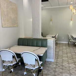 a table and chairs in a restaurant