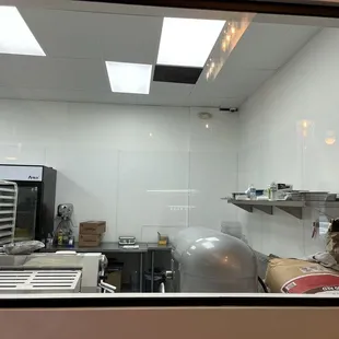 a view of a kitchen from a window