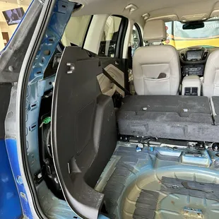 Missing pieces in the trunk of my car after repairing a leak.