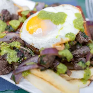 Lomo Saltado ($19 + $1.50/egg)