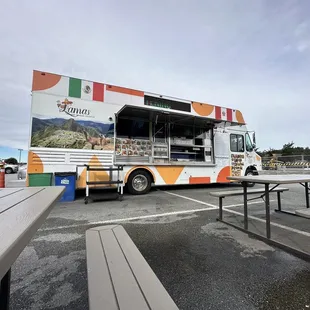 a food truck parked in a parking lot