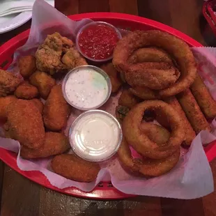 Combo basket. Clockwise from top left: Mushrooms, cauliflower, jalapeño poppers, onion rings, mozzarella sticks.