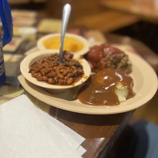 Meat loaf, mashed potatoes, baked beans, peaches
