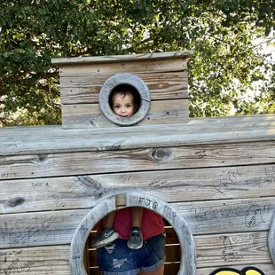 a girl in a pirate ship costume
