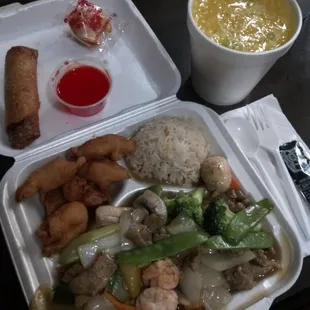 a meal in a styrofoam container