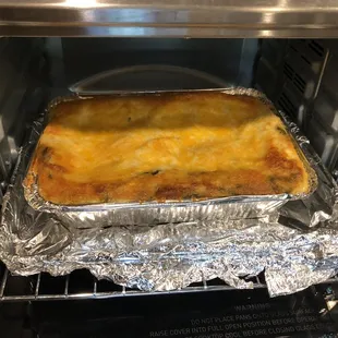 Chicken Spinach Enchilada Casserole. Prepared in a toaster oven, camping.