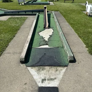 Torn up miniature golf course.
