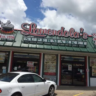 a car parked in front of the store
