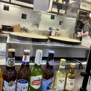 bottles of beer in a kitchen