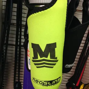 Neoslings, they can hold up to a 40oz bottle. Is adjustable, perfect for any age!