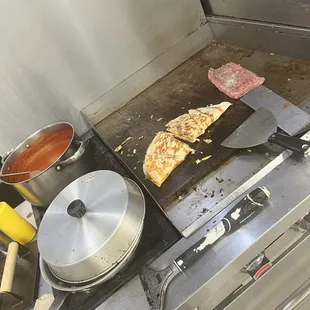 a pizza on a grill