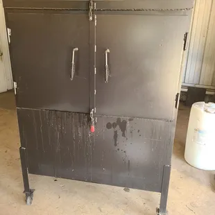 the inside of a metal cabinet