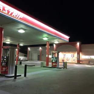 a gas station at night