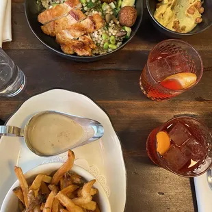 Hand Cut Fries w/au poivre sauce DL , Negronis, falafel salad with chickpeas, chicken, and hummus