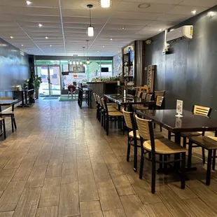 a restaurant with tables and chairs