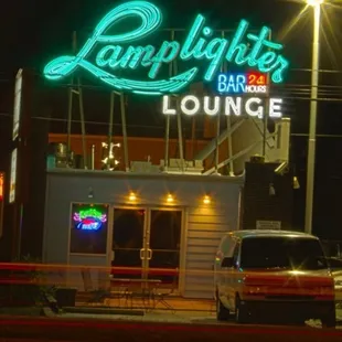 a neon sign for a lounge