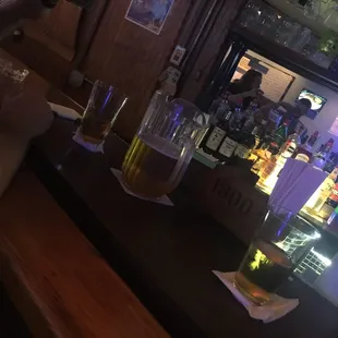 a person sitting at a bar