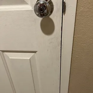 Filthy door in the bathroom.