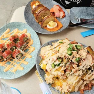 Crab and Tuna Roll, devilled eggs and lobster nachos