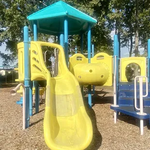 The medium slide (also had a puddle of water) and the outside view of the short tunnel