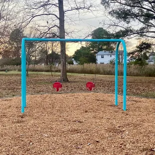 Updated buckets on the baby/toddler swings and mulch topoff