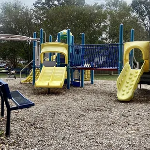 A view of the playground- short slides and a climbing option that's perfect for kids who enjoy climbing up slides