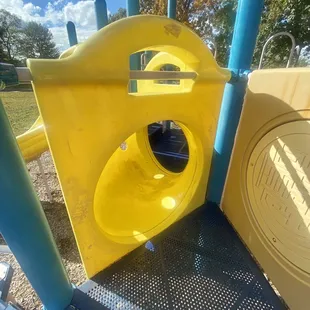 Part of the play structure is accessed by going through a short tunnel