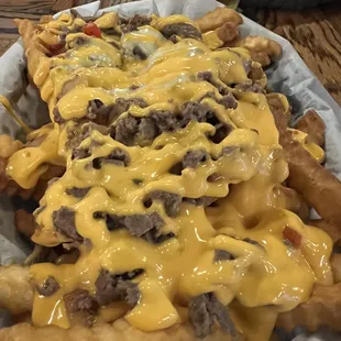 Loaded fries. Tre&apos;s House of Cheesesteaks rents the kitchen now.