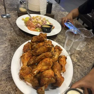 3lbs of wings and  a Antipasto Salad