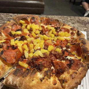 Pepperoni bacon bits and pineapple - it's a winner