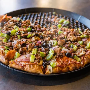 a pizza with various toppings