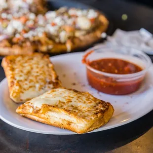 a white plate with a slice of pizza on it