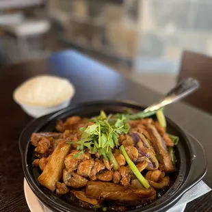Diced salty fish, chicken, and eggplant clay pot