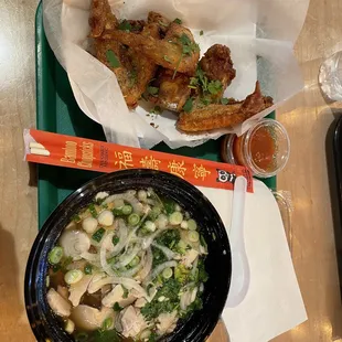 a tray of food and a drink
