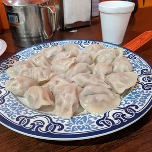 a plate of dumplings on a table