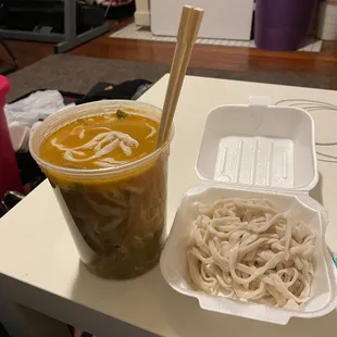 Mustard and shredded pork noodle soup