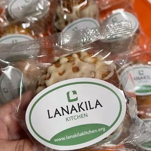 a person holding a bag of food