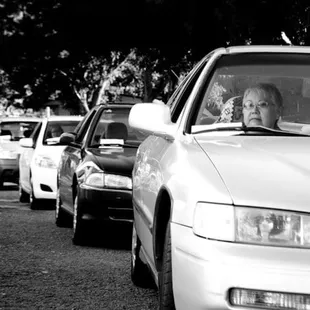 Volunteer drivers line up to pick-up the food they will deliver on Thanksgiving morning 2010.