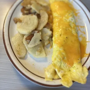 Veggie omelet- perfectly cooked and seasoned. Home fries were really good as well..