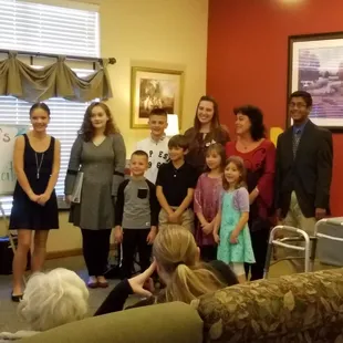 We bring our music to community: playing for an assisting living house