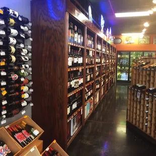 shelves of wine in a store