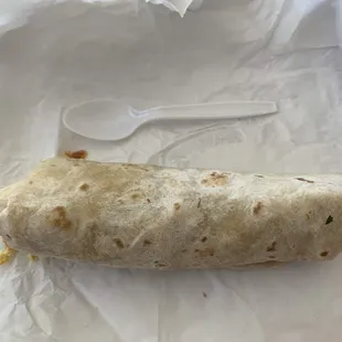 Breakfast burritos, they are nice size, spoon for reference.