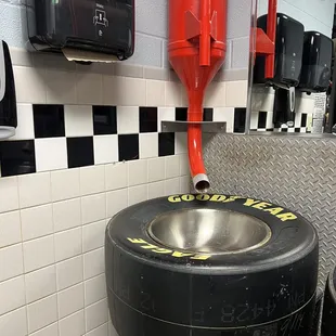 a sink with a tire on it