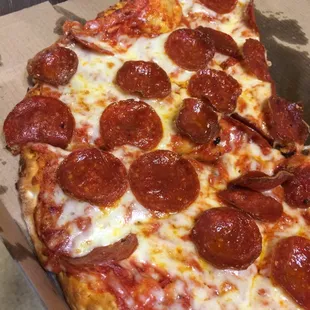a slice of pepperoni pizza