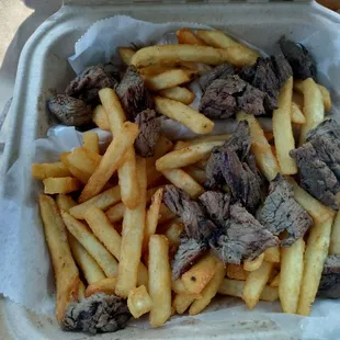 Steak Tips or Doggy Bits? ‍ Land Of Pizza, you can do better than this, and where&apos;s the sauce!? It&apos;s dry!